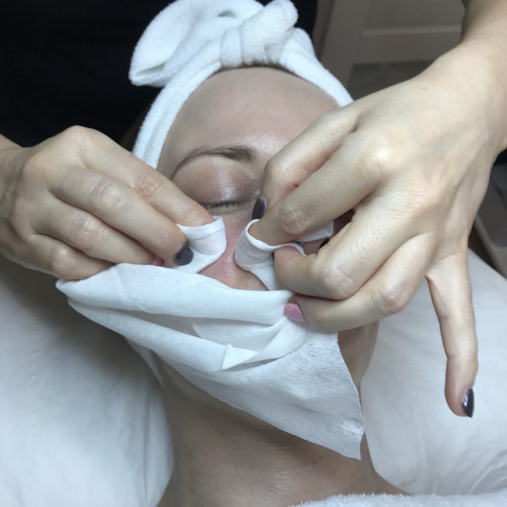 Extraction as part of a deep cleansing facial treatment